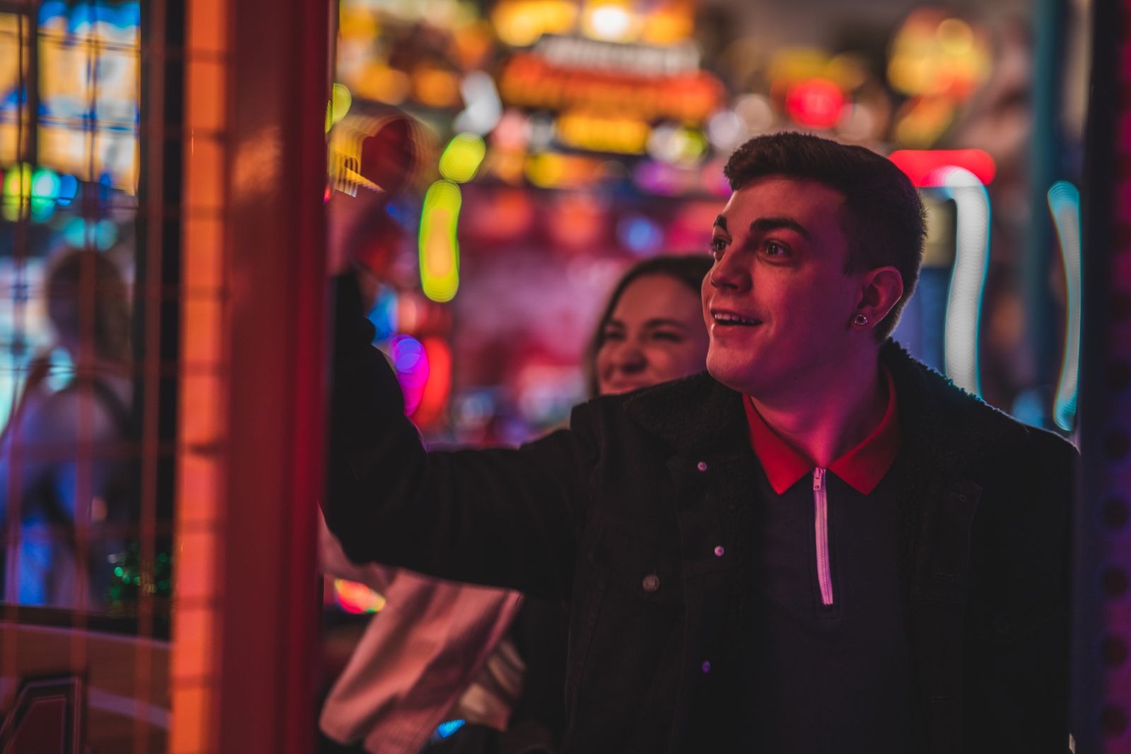 Couple playing arcade games